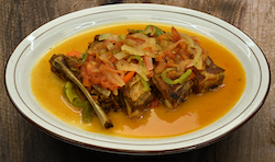 Costilla Entomatada / Pork Ribs With Sautéed Onions